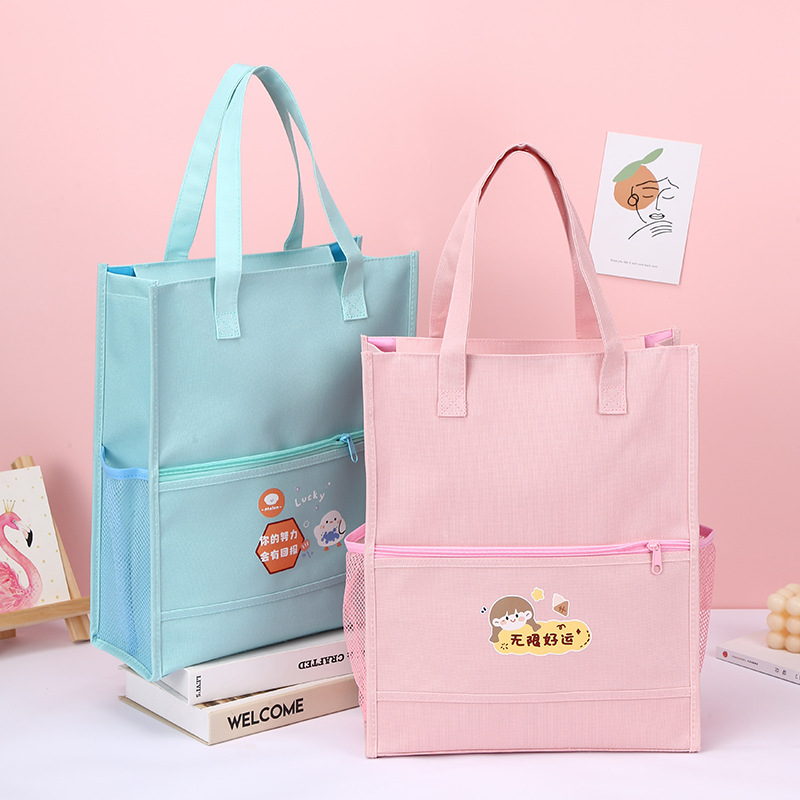 Factory direct supply of cartoon hand-held book bags for primary school students, lightweight and reducing burden. Carefully selected bags for after-school training and remedial classes. Practical and durable school bags for primary school students pic 1