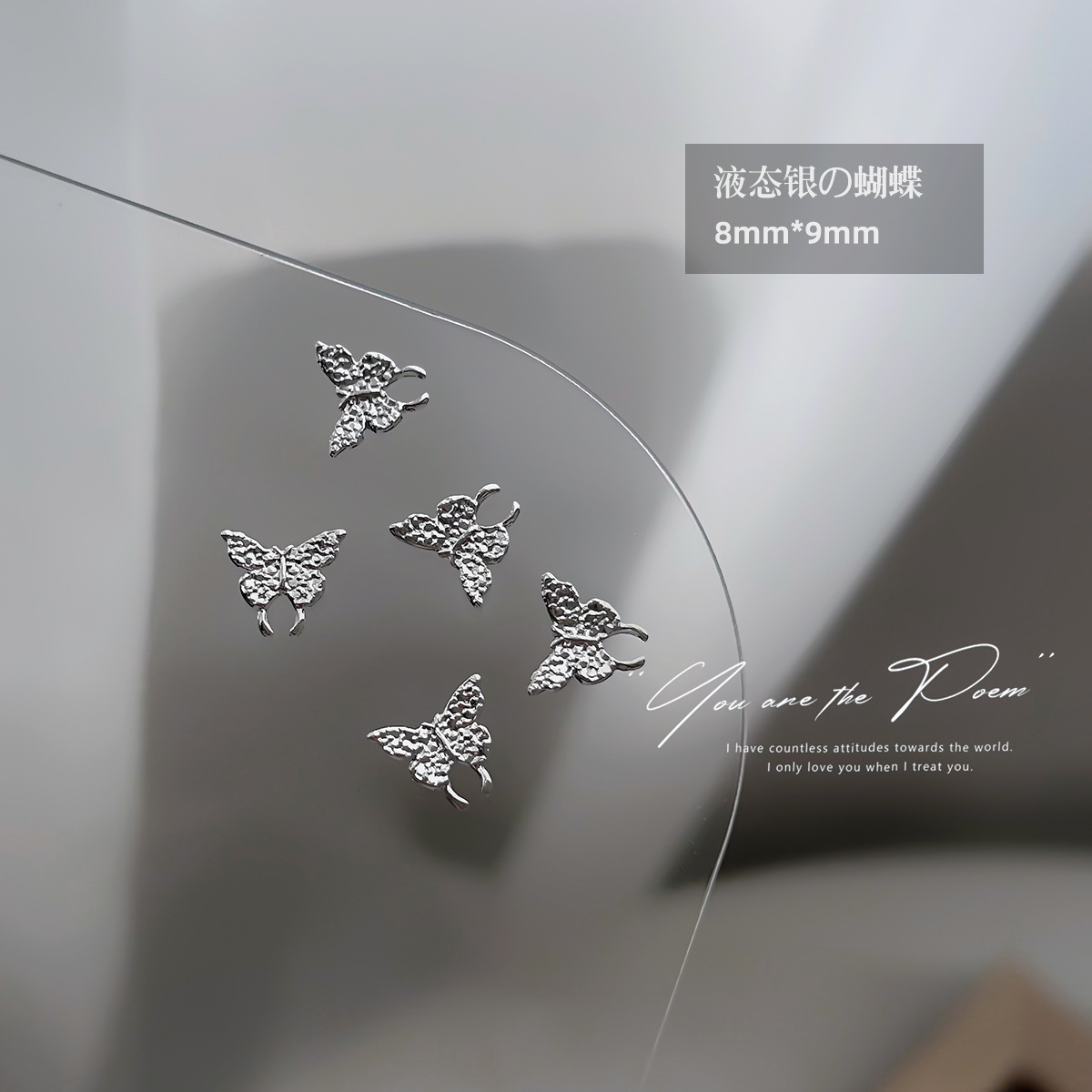 Wholesale of y2k liquid silver alloy butterfly wing hollowed-out mini bow tie nail accessories pic 10
