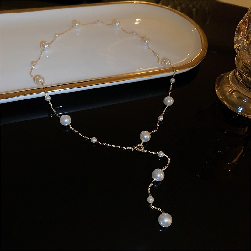 Irregular long pearl necklace, French light luxury style, sweater chain, niche simple and high-end necklace wholesale for women pic 11