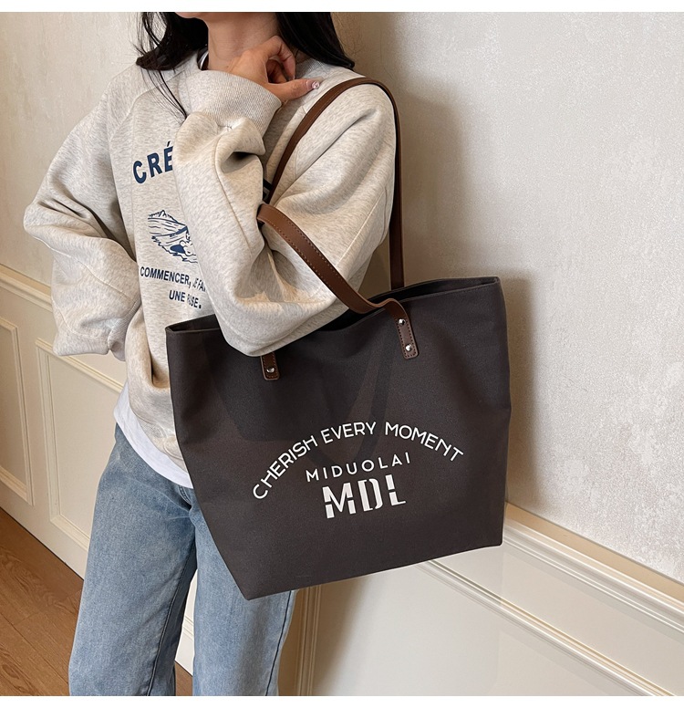 Large-capacity 2025 new style simple single-shoulder hand-carry cloth bag, college student class tote bag, versatile canvas bag for women pic 12