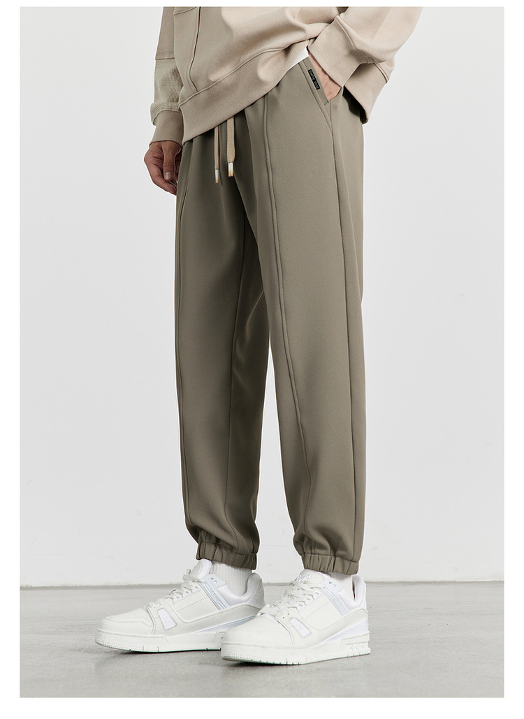 WOOG2005男装2024秋冬季新款抗皱束脚休闲裤男士卫裤运动裤 时尚舒适耐磨男士运动裤详情26