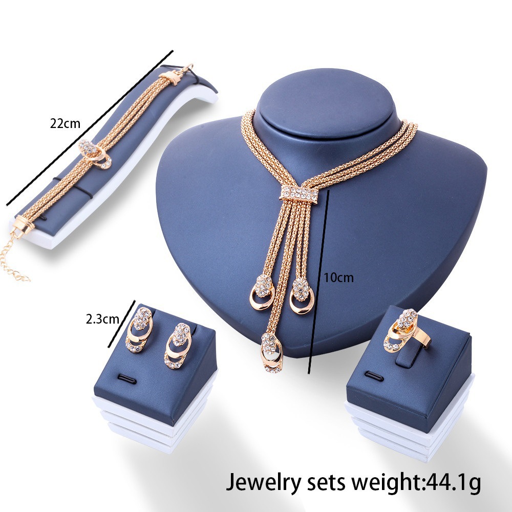 Cross-border best-selling gold-plated exaggerated crystal jewelry set, creative bride diamond-encrusted necklace, earrings and ring four-piece set pic 1