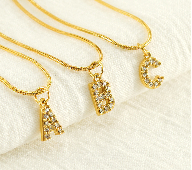 Cross-border European and American stainless steel fashion 26 English diamond-encrusted small letter necklace, simple and versatile titanium steel snake chain necklace for women pic 18