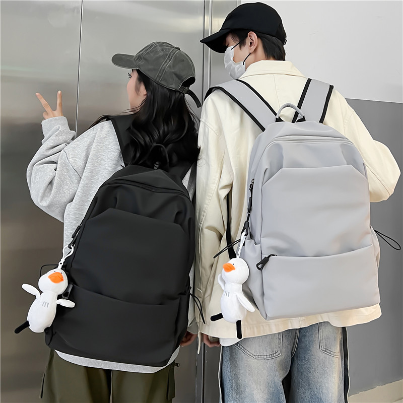 韩系大容量纯色双肩包女韩版简约百搭书包男初中背包女双肩大学生详情6