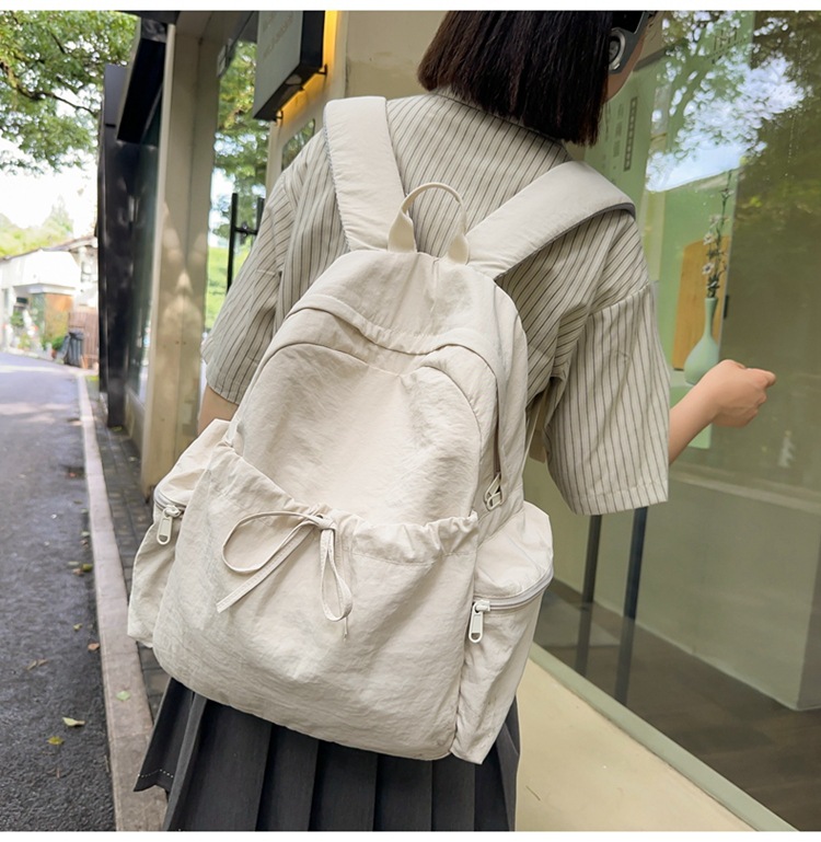 新款时尚轻便简约双肩包女日系文艺学生书包休闲运动旅行纯色背包详情23