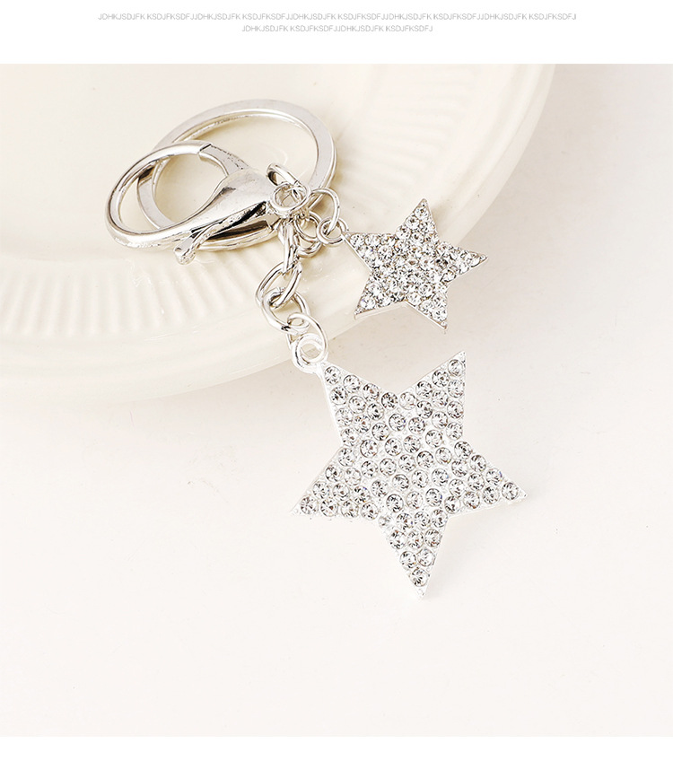 Wholesale of cross-border fashion diamond-encruted five-pointed star bags, keychains, metal star pendants and small gifts pic 6