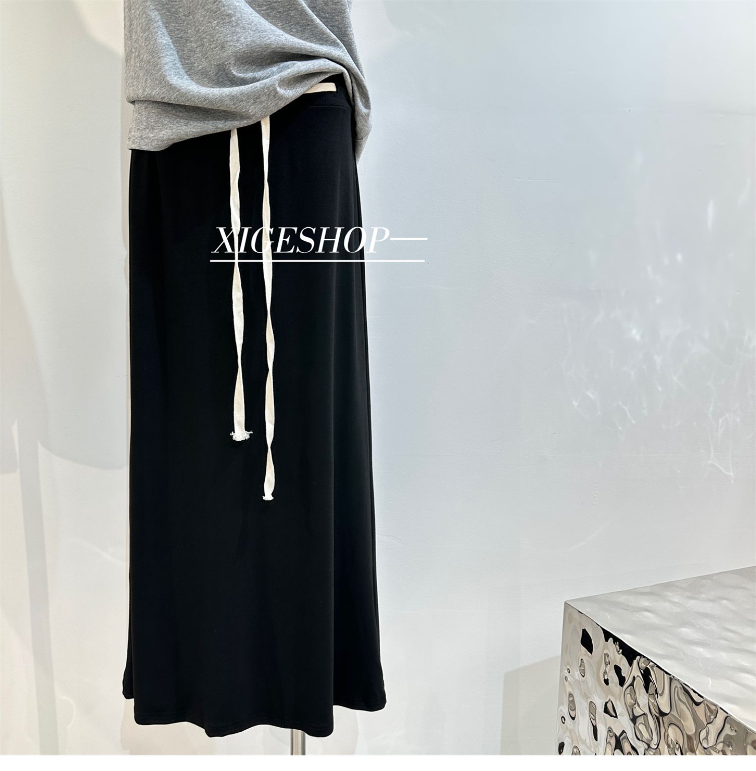 The contrasting color waist drawstring skirt is A high-waisted, slimming dress with a split mid-length, casual and versatile A-line skirt for women in summer pic 40