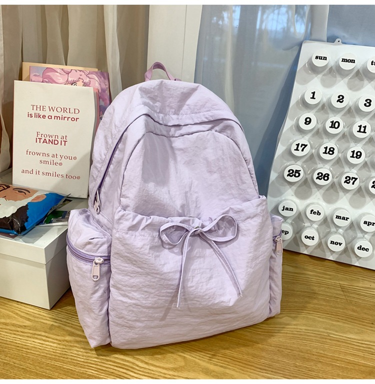 新款时尚轻便简约双肩包女日系文艺学生书包休闲运动旅行纯色背包详情35