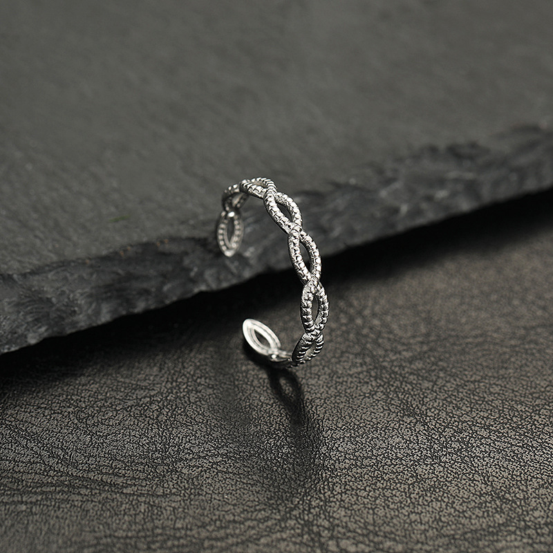 跨境供应 不锈钢开口可调饰品 个性镂空图案油压几何形钛钢戒指详情3