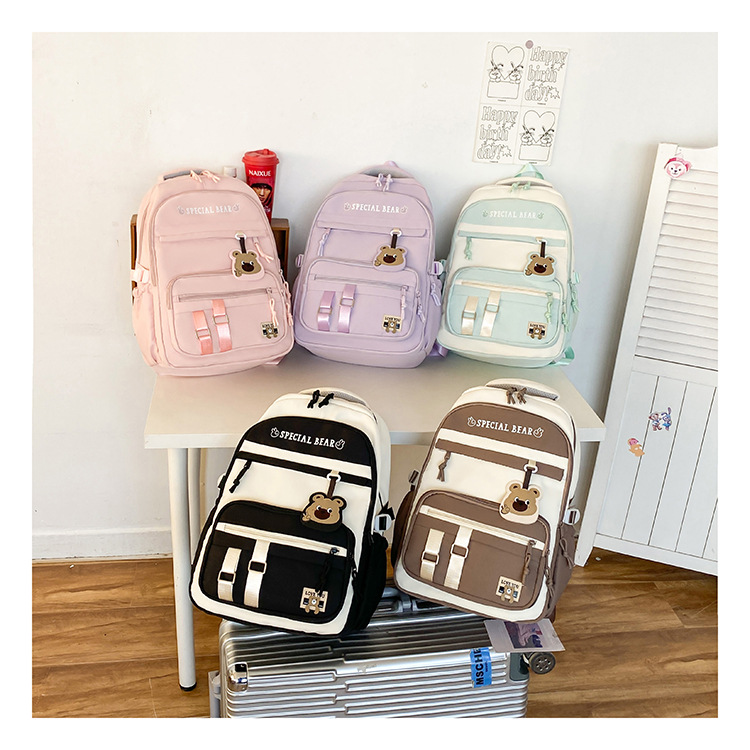 批发新款初高中学生大容量书包轻便减负背包小学生简约结实双肩包详情37