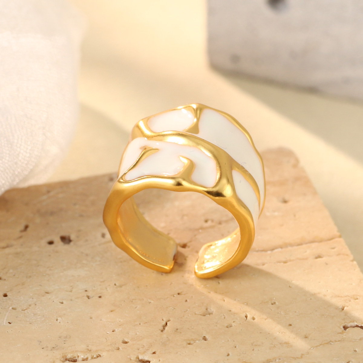 French geometric metal minimalist earrings with an irregular texture, white lava ring and enamel adjustable joints pic 17