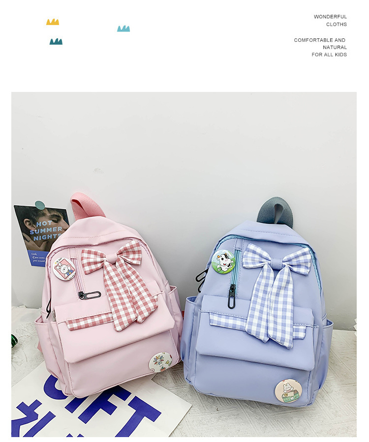 蝴蝶结书包女小学生大容量三到六年级初中轻便减负可爱简约双肩包详情9