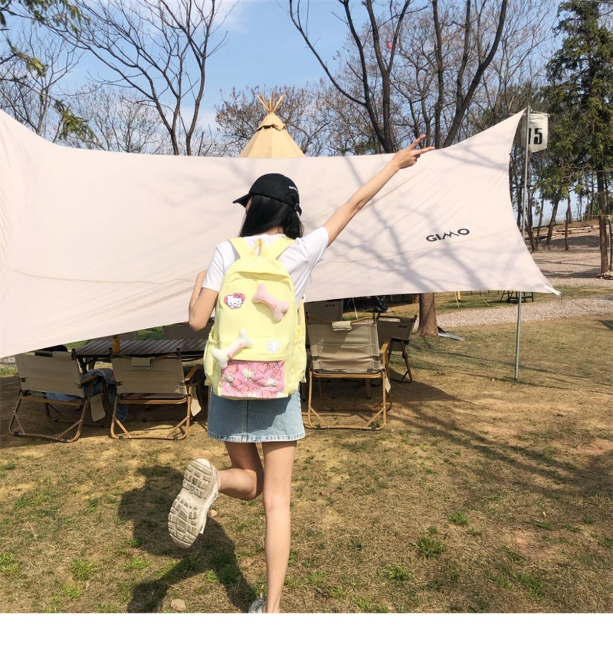 辣妹设计感背包可爱卡通猫猫骨头大容量清新黄色书包大学生双肩包详情11