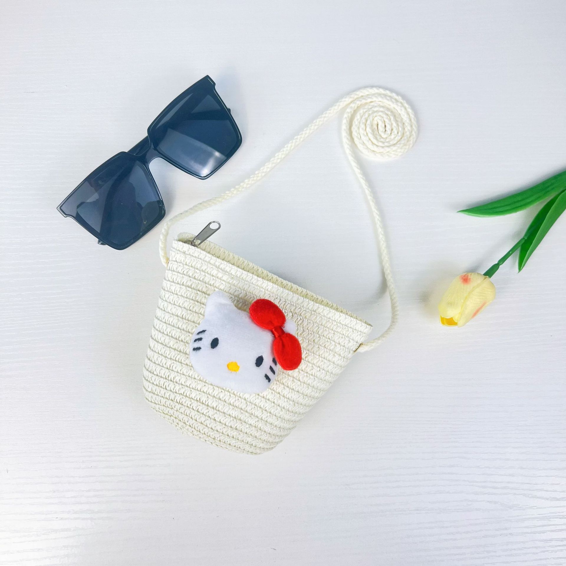 儿童手工编织包包可爱卡通猫草编小包男女童小圆包宝宝零钱包批发详情16