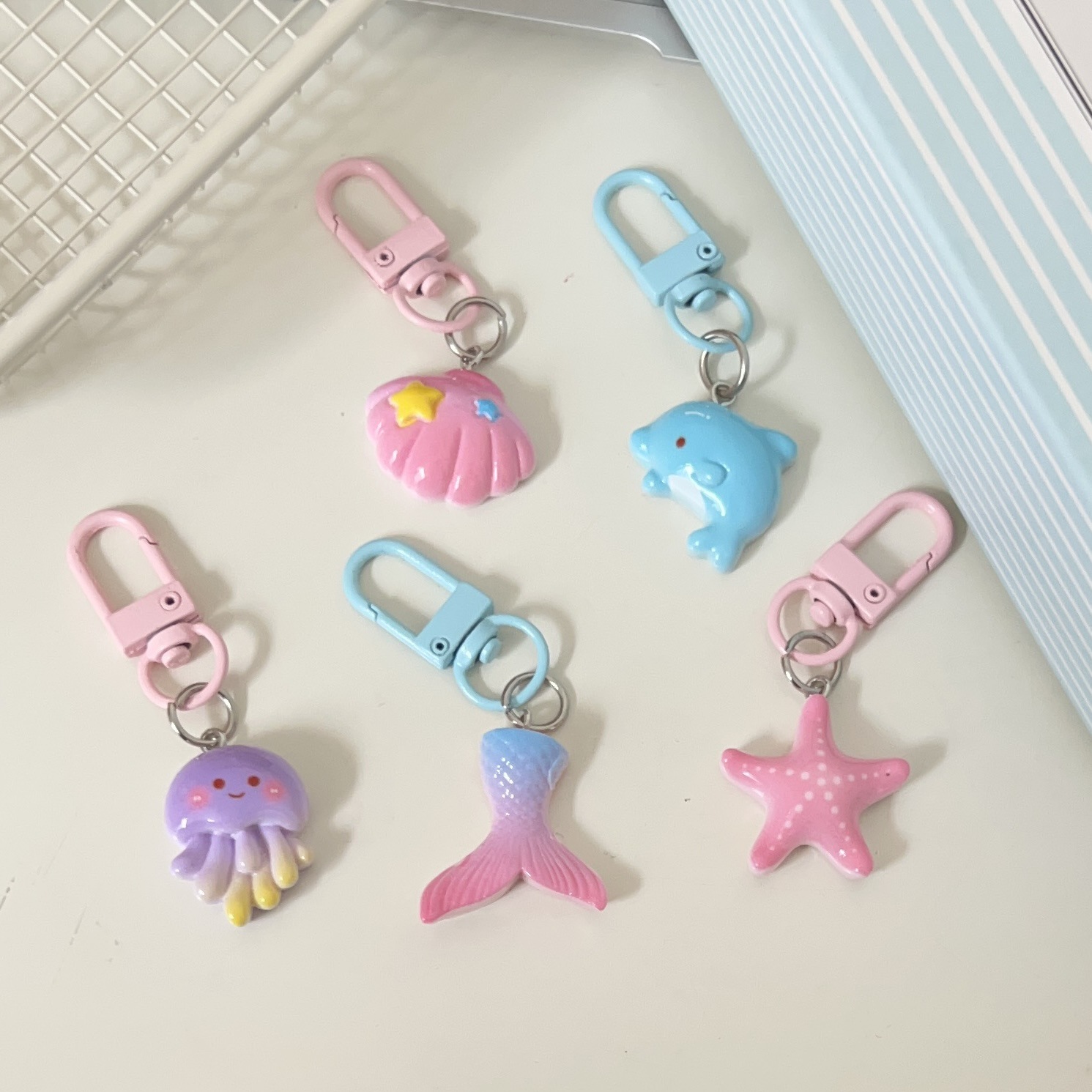 Pink and tender Marine animal keychains, cute cartoon dolphin shell pendants, ins soft and adorable starfish and jellyfish accessories pic 3