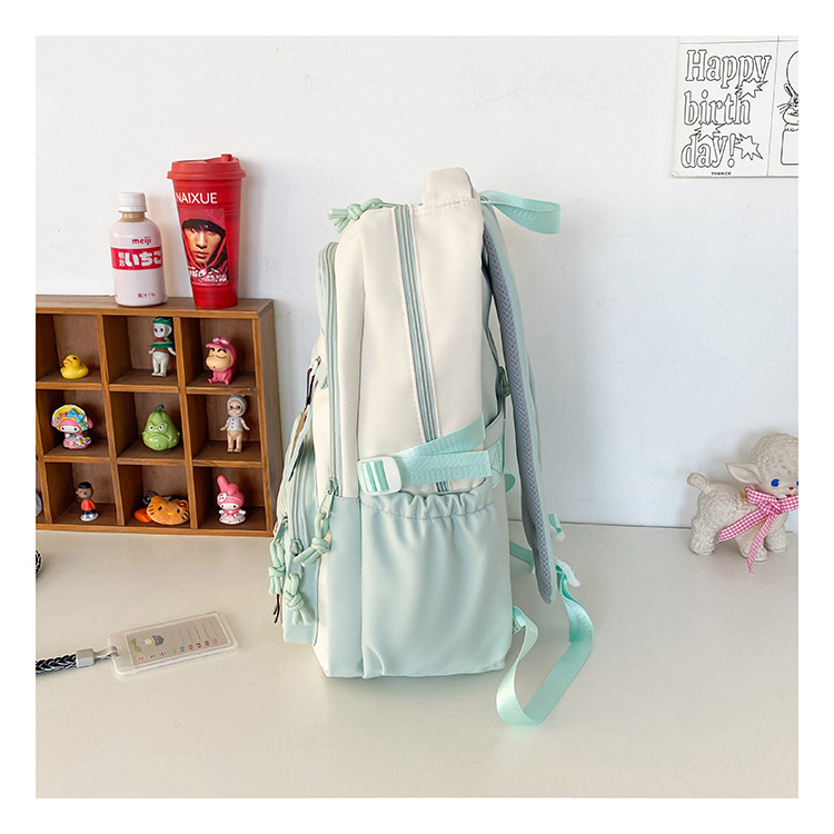 批发新款初高中学生大容量书包轻便减负背包小学生简约结实双肩包详情24