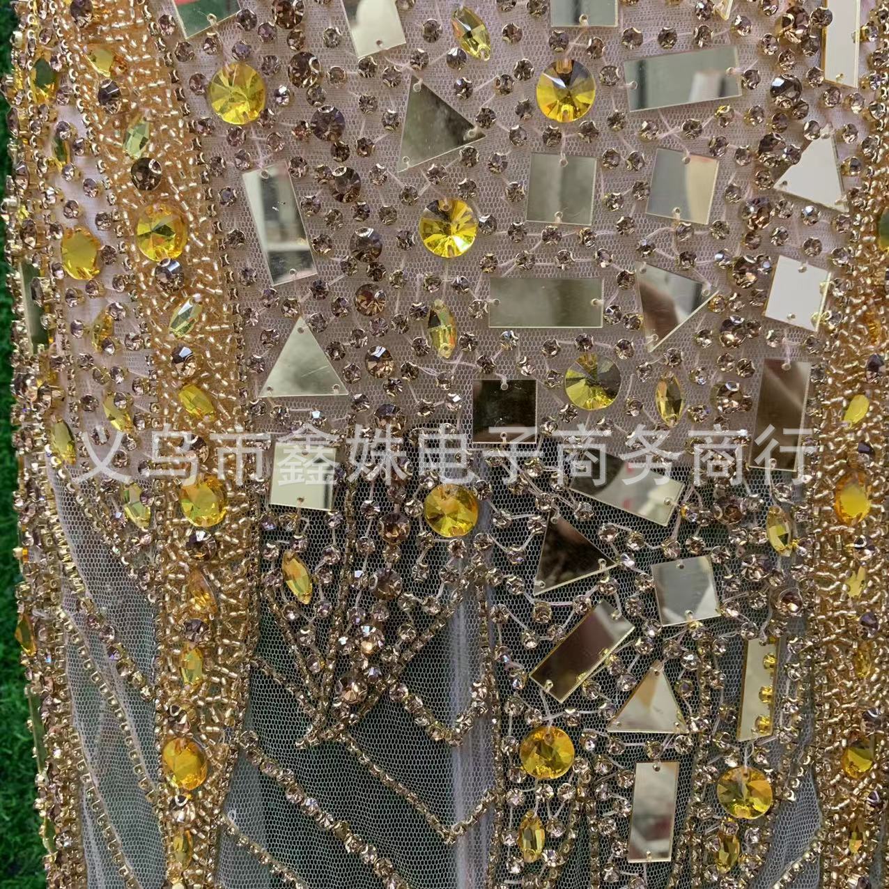 The new deep V wedding dress features heavy handcrafted mirror stitching, beaded mesh and applique pic 7