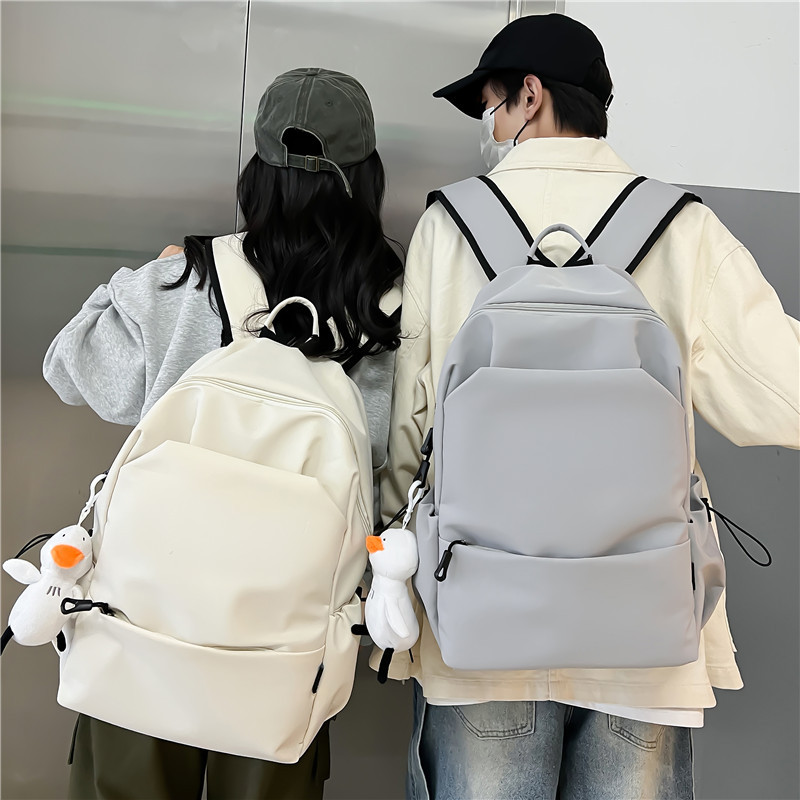 韩系大容量纯色双肩包女韩版简约百搭书包男初中背包女双肩大学生详情10