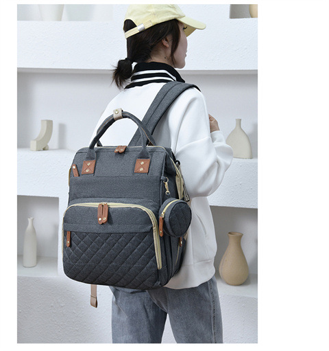 跨境专供高级感妈咪包大容量轻便母婴床包挂童车多功能手提双肩包详情26