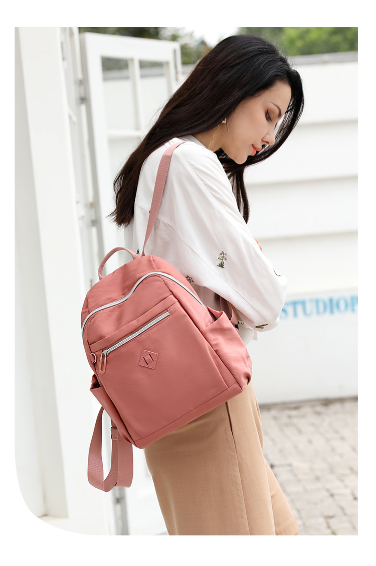 大容量双肩包女士时尚潮流韩版背包防泼水出行旅行包情侣韩版书包详情8