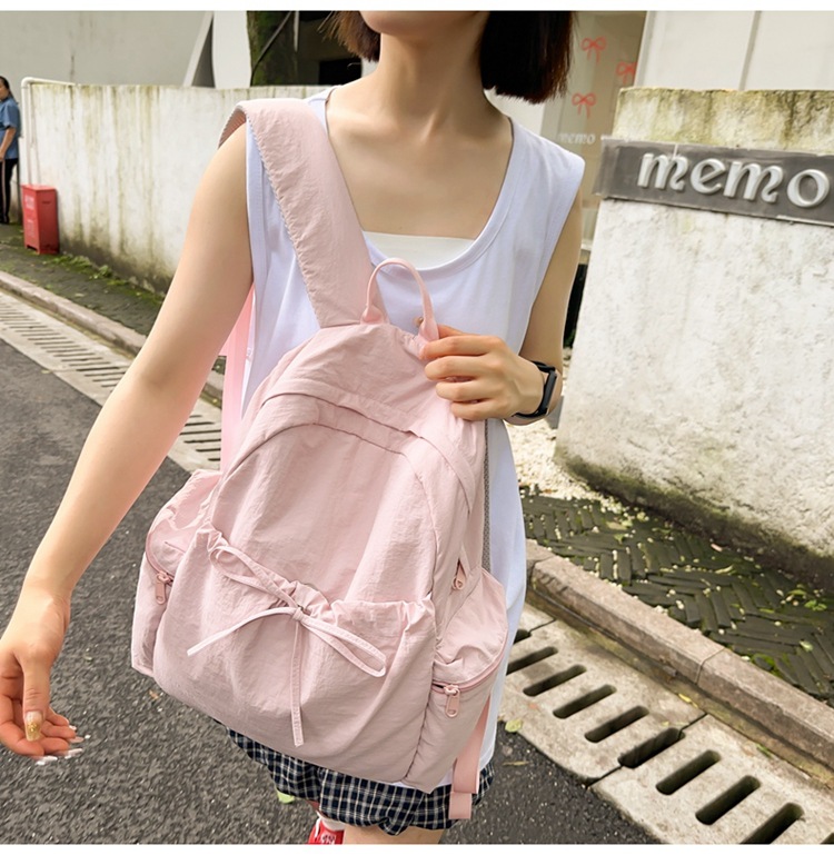 新款时尚轻便简约双肩包女日系文艺学生书包休闲运动旅行纯色背包详情18