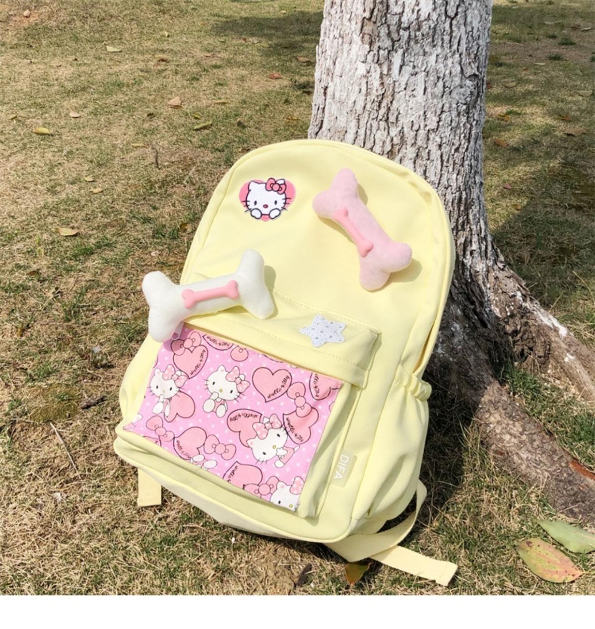 辣妹设计感背包可爱卡通猫猫骨头大容量清新黄色书包大学生双肩包详情7