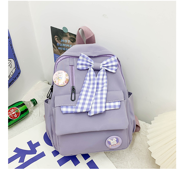 蝴蝶结书包女小学生大容量三到六年级初中轻便减负可爱简约双肩包详情15