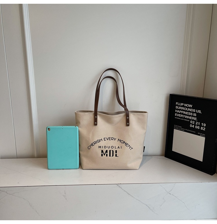 Large-capacity 2025 new style simple single-shoulder hand-carry cloth bag, college student class tote bag, versatile canvas bag for women pic 24