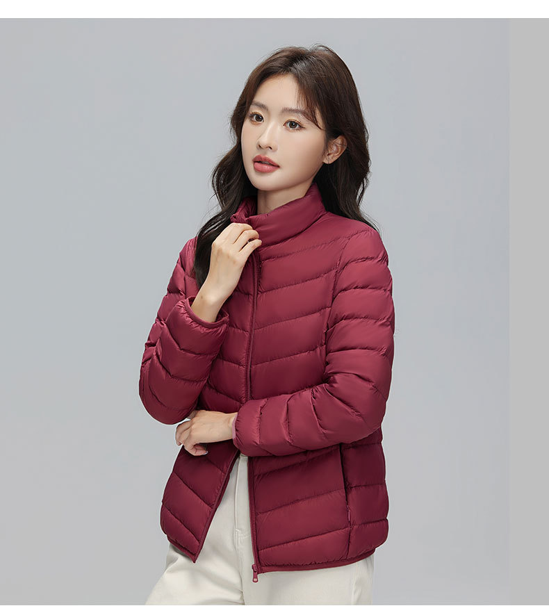 A light and thin down jacket for women in the autumn and winter of 2025, a short 90mm white duck down winter stand-up collar, a slimming casual coat trend pic 24