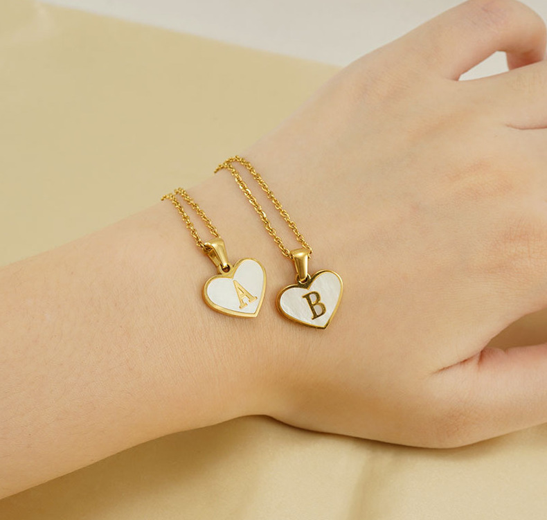Cross-border bestseller: 26-letter heart-shaped shell necklace, a versatile stainless steel letter pendant for women with a European and American style pic 29