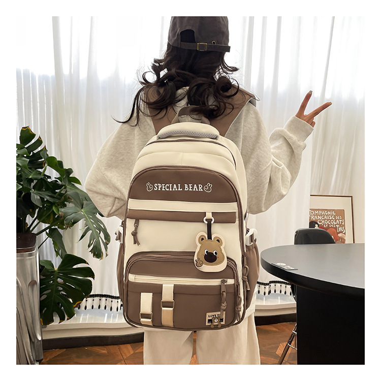 批发新款初高中学生大容量书包轻便减负背包小学生简约结实双肩包详情8