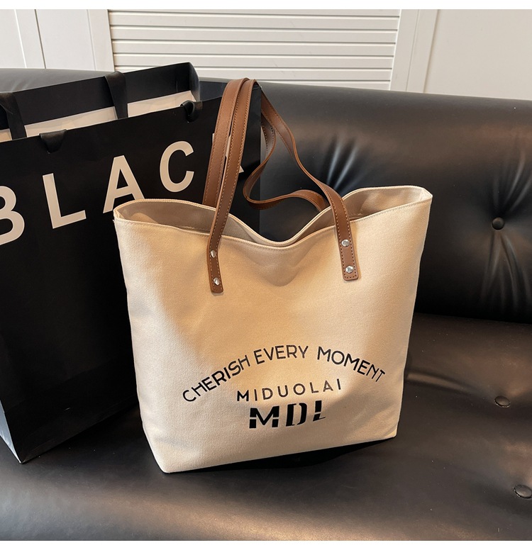 Large-capacity 2025 new style simple single-shoulder hand-carry cloth bag, college student class tote bag, versatile canvas bag for women pic 6