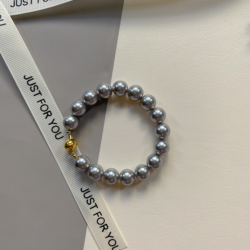 This is a trendy accessory for women, featuring a strong Australian white round magnetic pearl bracelet. It exudes a light luxury, niche and high-end vibe pic 19