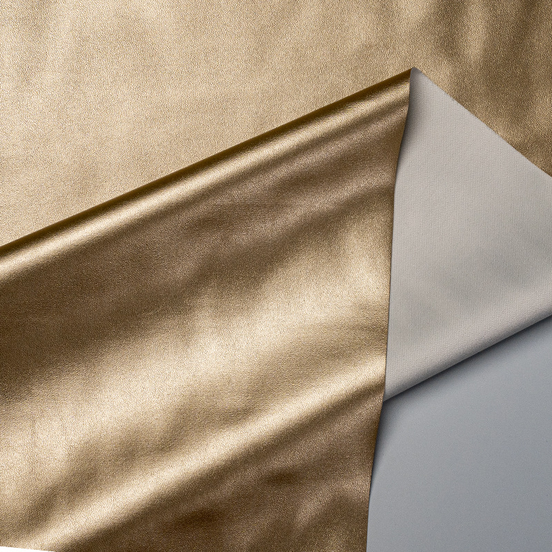 批发肤感柔软垂感pu人造革弹力针织时尚男女服装童装皮革面料详情13