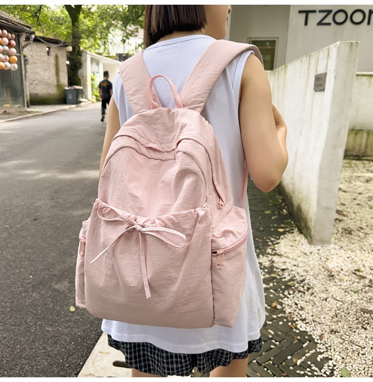 新款时尚轻便简约双肩包女日系文艺学生书包休闲运动旅行纯色背包详情21