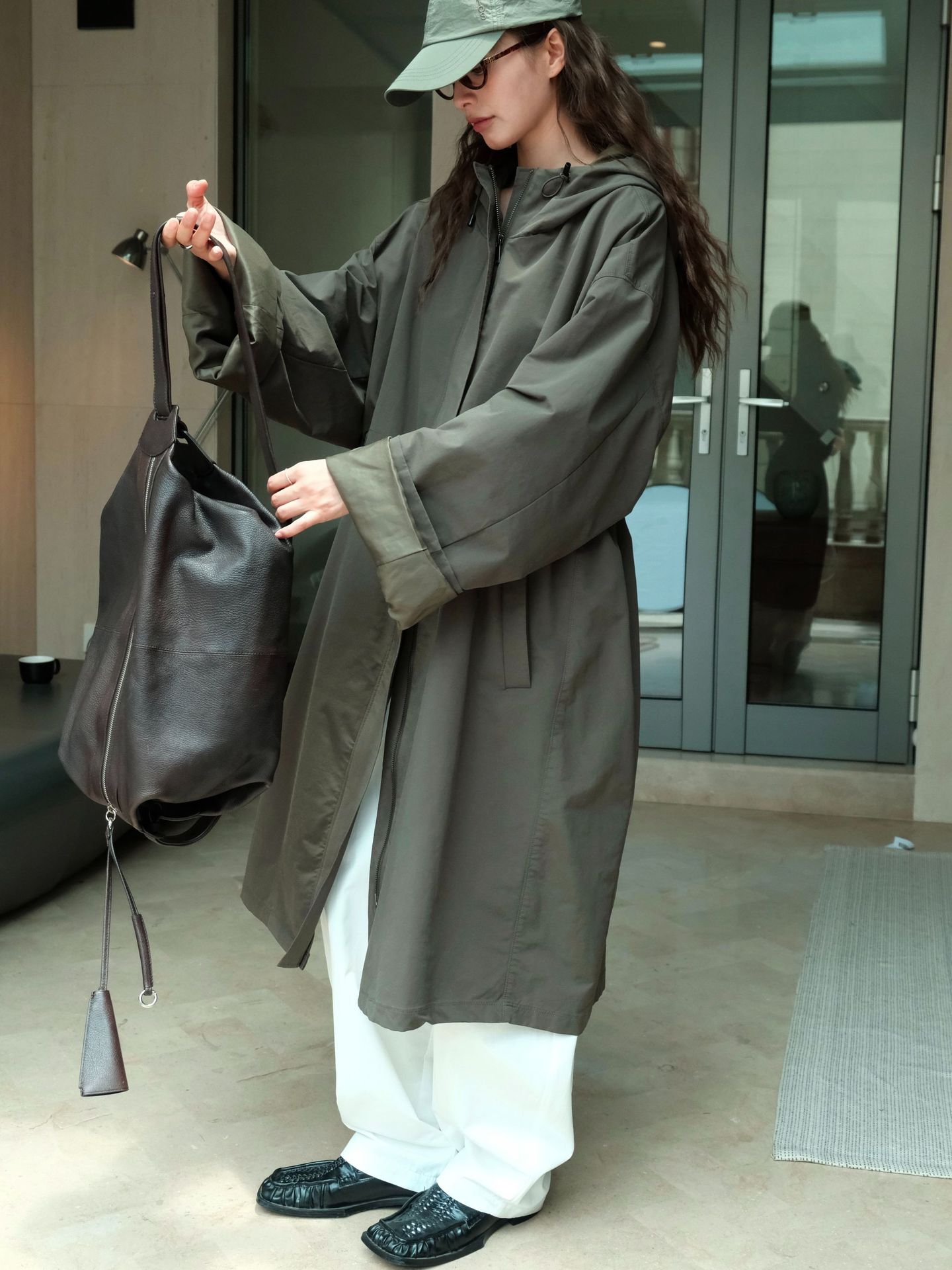 The new autumn Japanese-style outdoor street casual hooded silhouette windbreaker is a slimming and windproof long coat for women pic 14