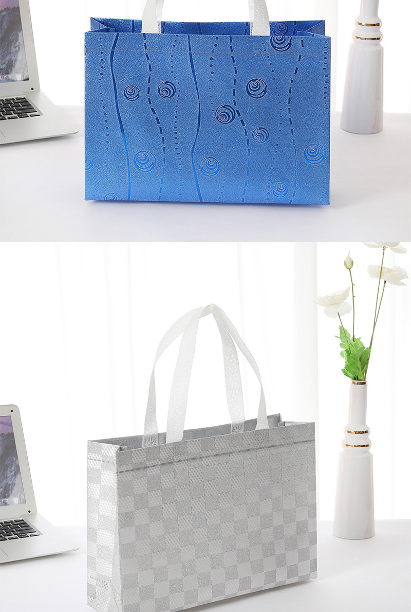 时尚手提无纺布袋 热压彩印覆膜镭射设计 广告服装购物礼品袋 现货批发环保耐用详情12