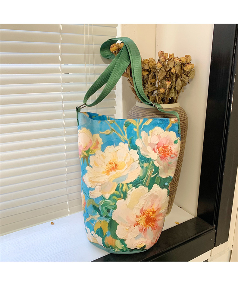 大容量国风印花水桶包女创意花卉个性手提单肩包设计感休闲斜挎包详情17