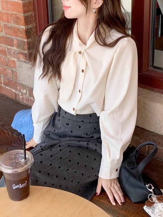A French retro white bow tie top for women in autumn and winter, paired with a puffed-sleeve corduroy shirt and a stylish inner shirt pic 3
