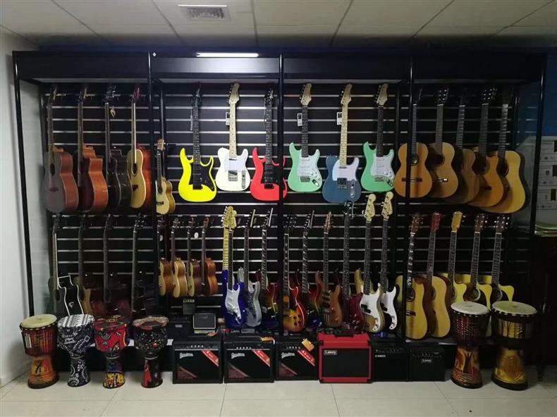 万用饰品挂板槽板展示架琴行乐器吉他墙手机配件文具超市装饰坑板详情1