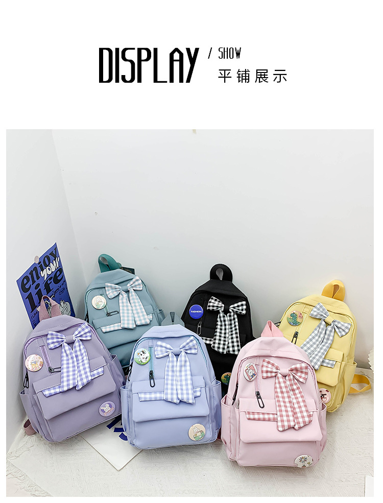 蝴蝶结书包女小学生大容量三到六年级初中轻便减负可爱简约双肩包详情7