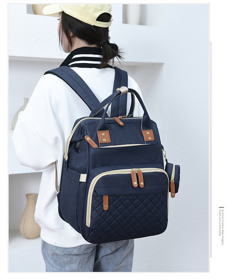 跨境专供高级感妈咪包大容量轻便母婴床包挂童车多功能手提双肩包详情27