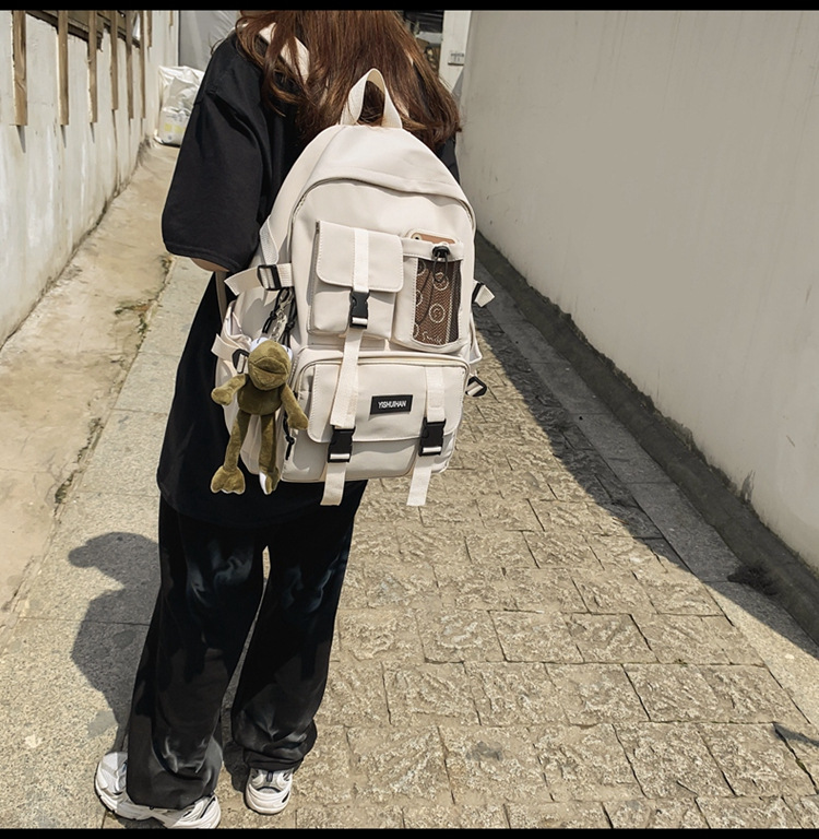 休闲百搭男女双肩包可爱挂件洋气潮流学生书包大容量工装风背包详情24