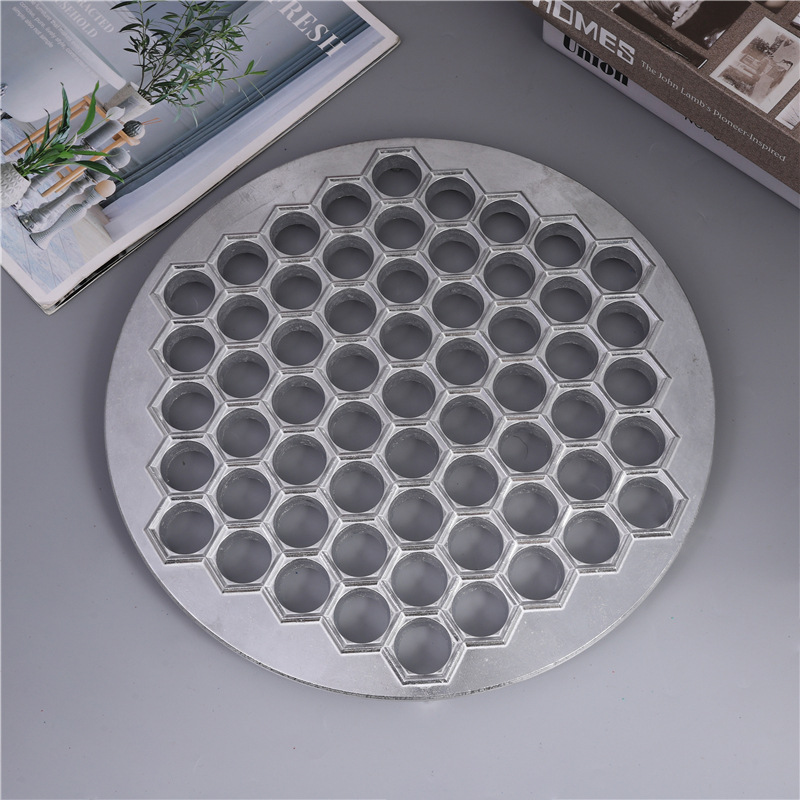 The new dumpling mold, a handy tool for lazy people to make dumplings, is a 61-hole aluminum alloy dumpling mold and kitchen accessory that is selling well across borders pic 1