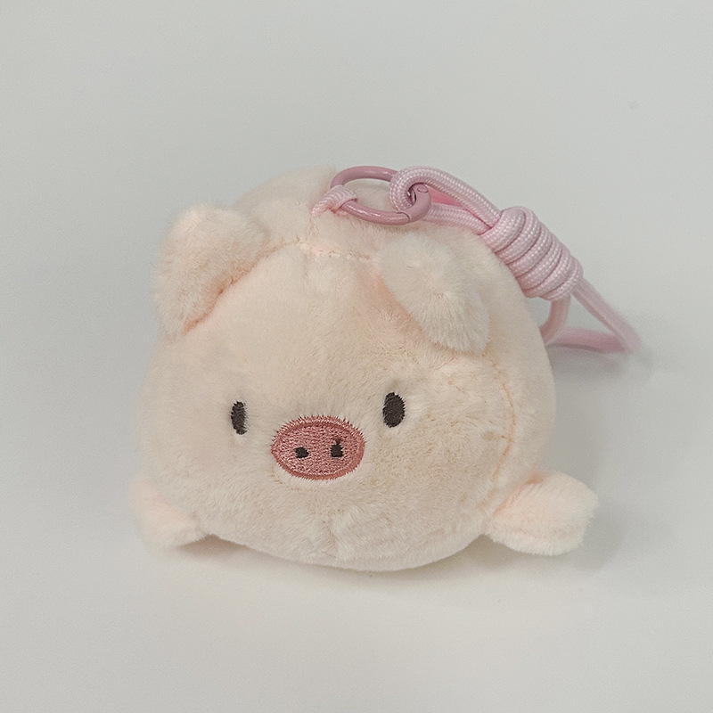 The little cat doll that wags its tail by pulling a rope is called the popular little white rabbit plush toy backpack doll at the street stall pic 14