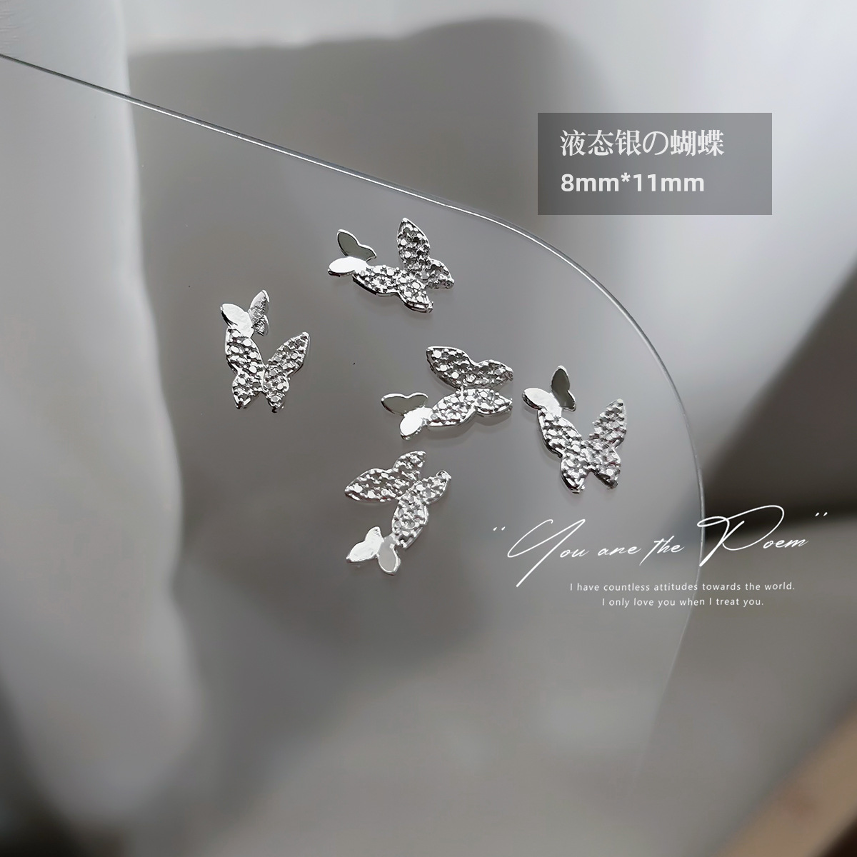 Wholesale of y2k liquid silver alloy butterfly wing hollowed-out mini bow tie nail accessories pic 9