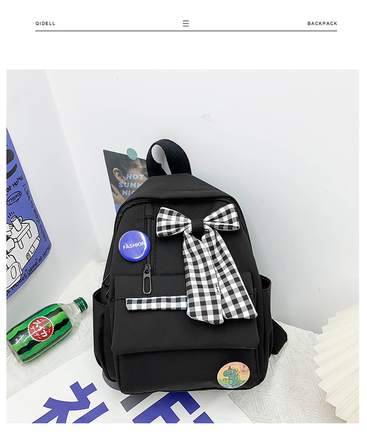 蝴蝶结书包女小学生大容量三到六年级初中轻便减负可爱简约双肩包详情13