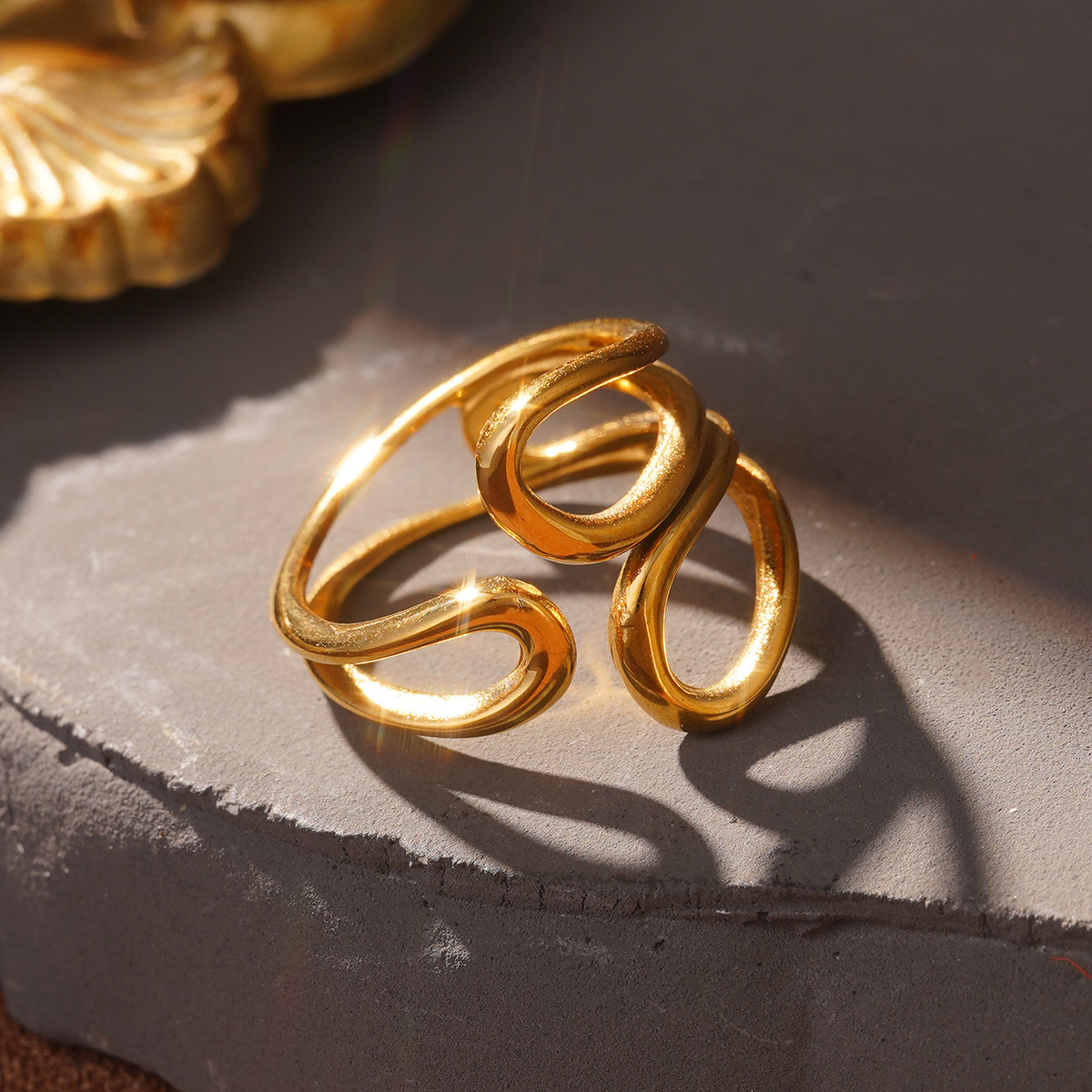 European and American fashionable stainless steel rings with hollowed-out, niche wide lines, high-end design sense, and gold jewelry wholesale pic 33