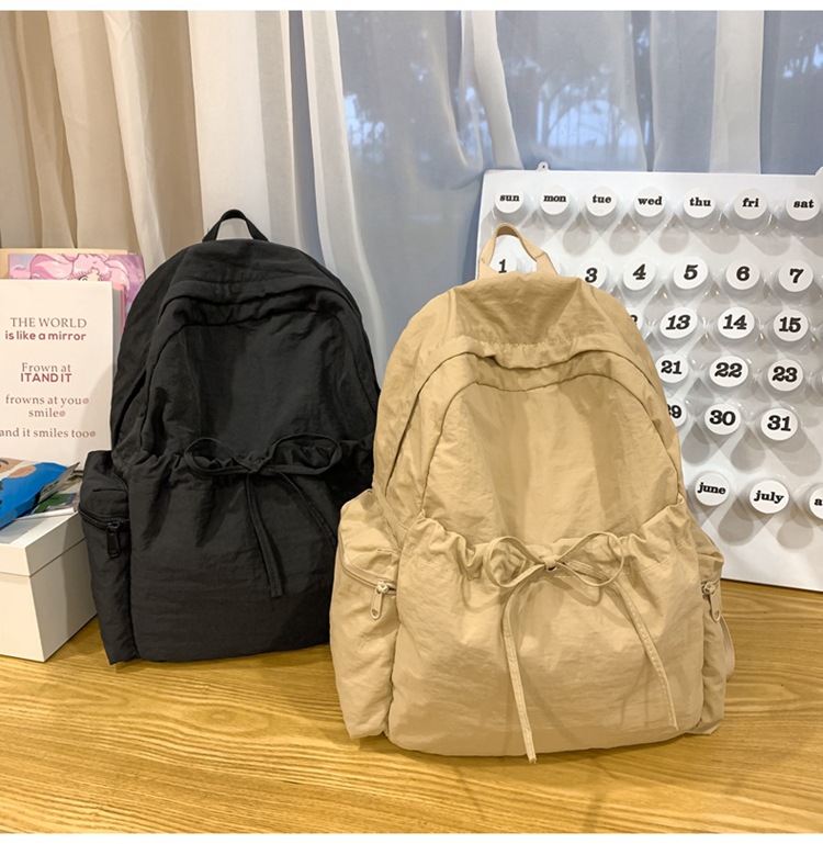 新款时尚轻便简约双肩包女日系文艺学生书包休闲运动旅行纯色背包详情33