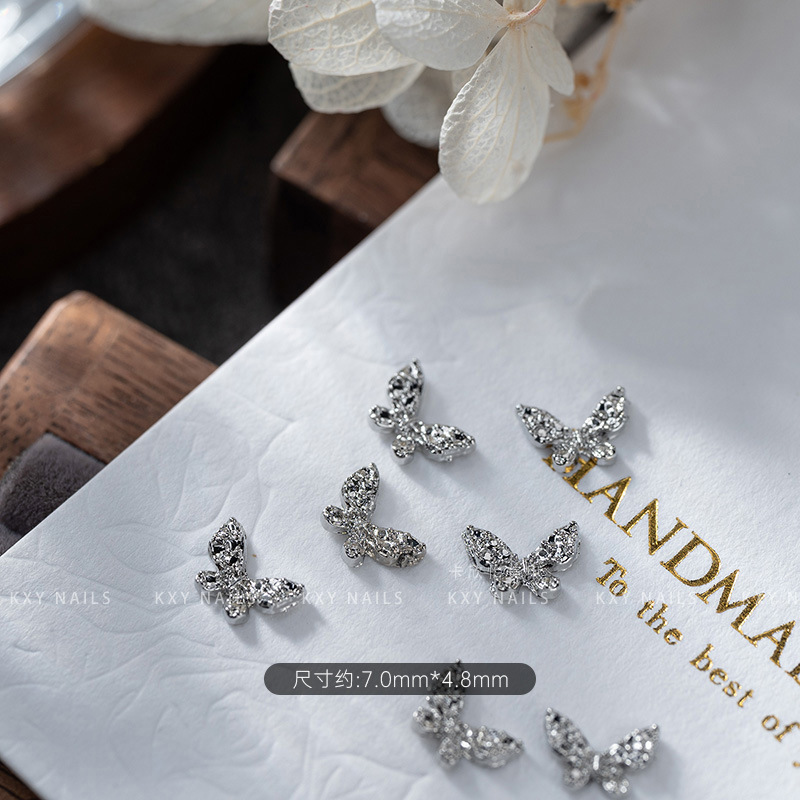 The alloy butterfly bow tie series of nail art accessories is a popular three-dimensional bestseller. It is a high-end and light luxury nail accessory with a butterfly diamond pattern pic 2